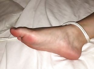 Sexy tiny feet tied to bed and fingered