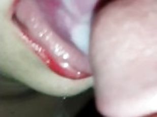 Close up cum overflows out of moms mouth.