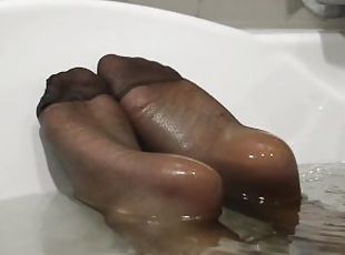 Juicy wet feet dancing in bathroom trailer