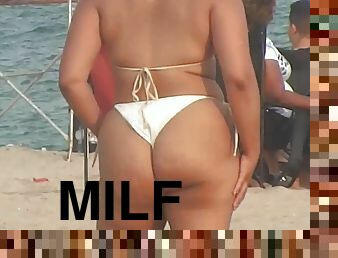 Hot MILF with huge bottom comes to local beach