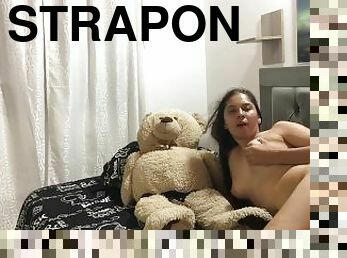 Solo girl masturbating with her very wet pussy and strapon on teddy bear