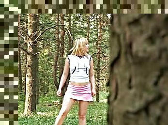 Short skirt girl has voyeur piss in the woods