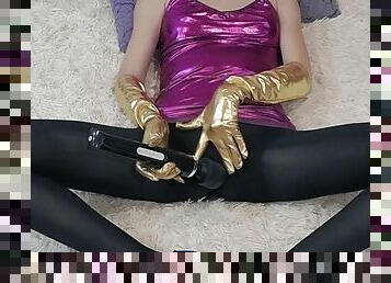 Girl in black pantyhose masturbates with a vibrator