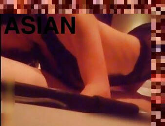 Asian girl giving sensual bj