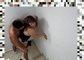 Camera in a building captures a horny couple fucking on the stairs. Part 2. They fuck no matter who
