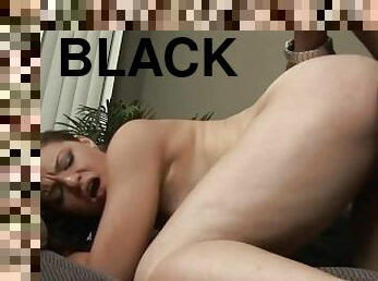 Brunette slut gets her wet pussy fucked by a black cock during interracial amateur sex