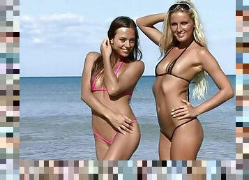 Blonde and brunette model posing in her sexy bikini super