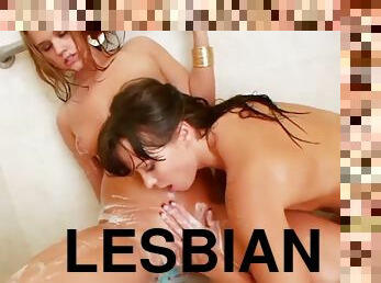 Gorgeous enema lesbians play in the shower