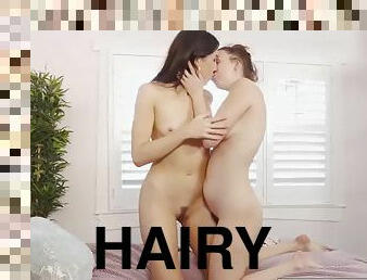 Hairy lesbian gets licked before giving a rimming