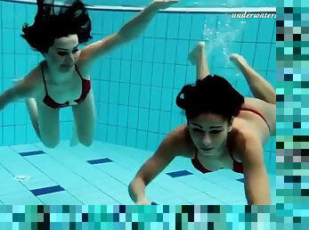 Nina Markova and Zlata Oduvanchik swimming naked in the pool