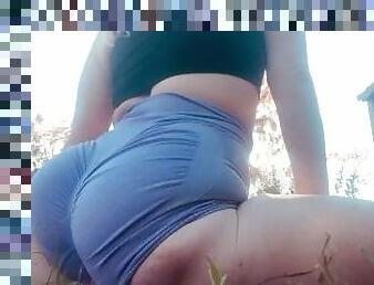Stretchy flexible pawg country girl stretches and strips outside on the land