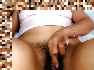 Horny college girl makes a living showing her hairy pussy on the internet