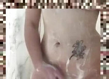 Wife soaps up in the shower and plays with herself