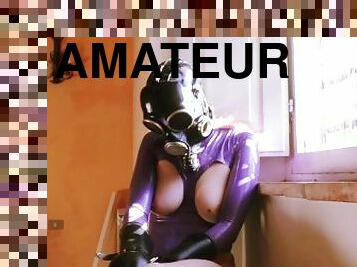 Rubberdoll in gasmask and bondage masturbating