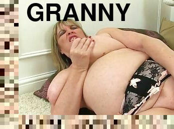 English granny zadi stuffs her fanny in bathroom