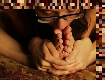 Model with twintails and glasses licks her cute feet clean
