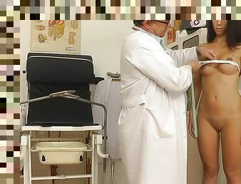 Doctor exam of a brunette young girl