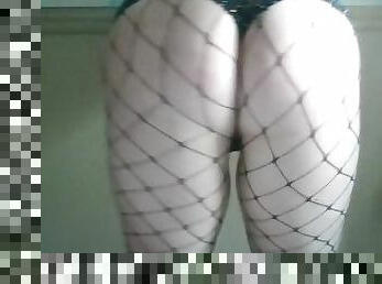 Long haired Goddess twerking in fishnets