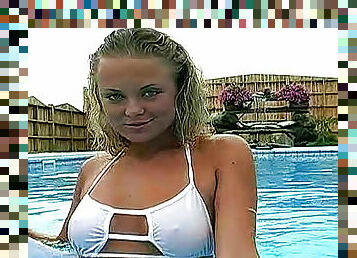 Bikini girl goes topless in pool