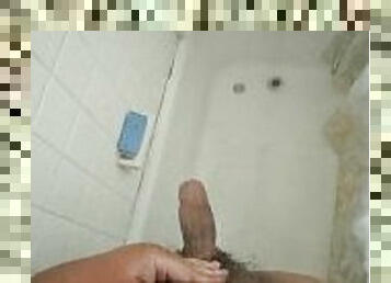 Hard Asian foreskin penis far view