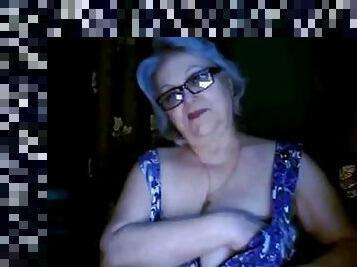 Russian granny ex-teacher shows off her big tits on webcam
