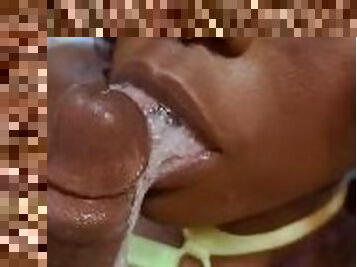 Black Teen playing with a mouth full of cum