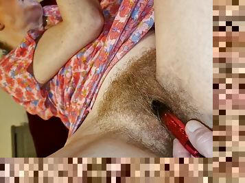 I caress her pussy with a small vibrator
