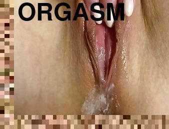 White cream is flowing out of tight horny pussy. Dripping pussy juice and visible orgasm contraction