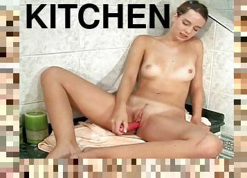 Aneta is masturbating in the kitchen