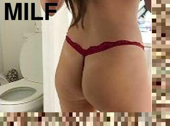 South American college girl dancing while brushing her teeth in a thong