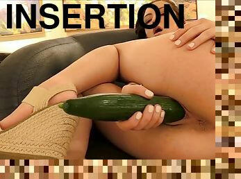 Lily just found a huge cucumber and cant wait to have fun with it!