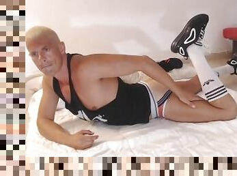 Gay blond guy in the hot pose