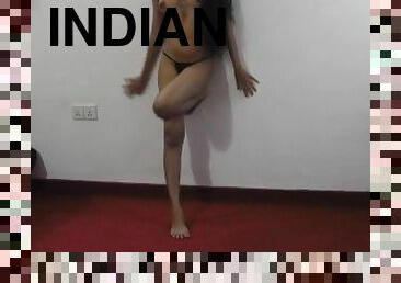 indian college girl working on a night club and practice dancing