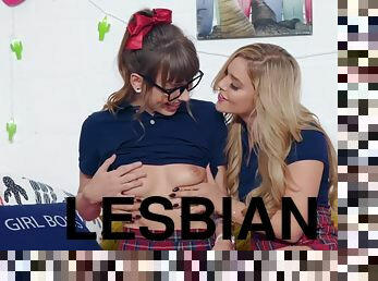 Blonde and brunette schoolgirls trying lesbian sex