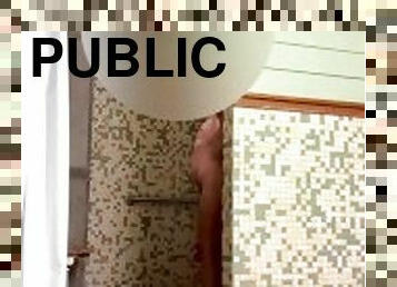 Nude in the men’s bathhouse.