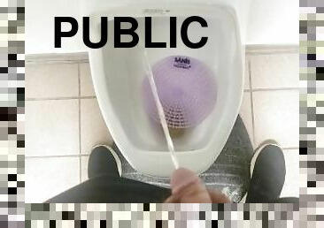 Pissing in a urinal