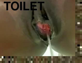 Long pee stream on toilet