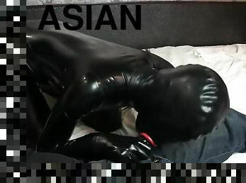 Asian In Condom Suit Blowjob