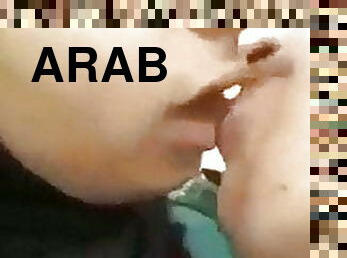Arab sex, he sucks on her boobs in the street