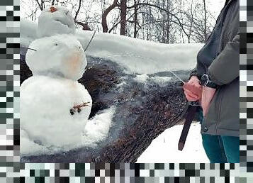 A man with a hairy dick made a snowman in winter and pissed on him from head to toe. Yellow snow