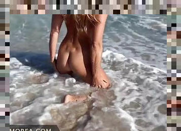 Blonde slutwife shows off to strangers nude and exposed on public beach