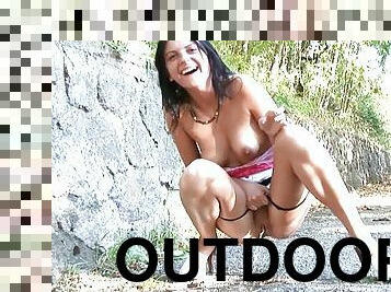 Brunette pissing in outdoor solo