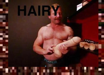 Hairy Beefcake Colby Jansen Shows Off Huge Dildo Collection