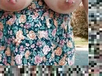 Flashing my huge tits before spraying piss all over the place outside