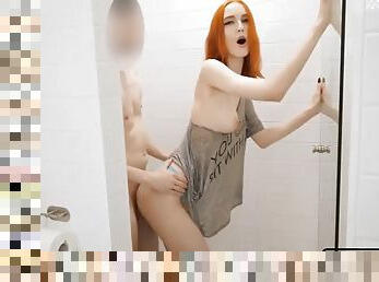 Redhead gets fucked in the shower and gets a facial
