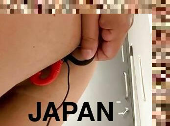 A handsome Japanese guy pulls an enemagra out of his anus and panting for pleasure