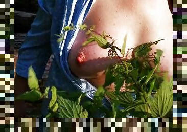 Boobs and nettles extreme in public