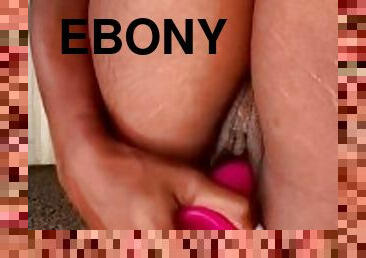 Horny ebony sucks and fucks her toys.