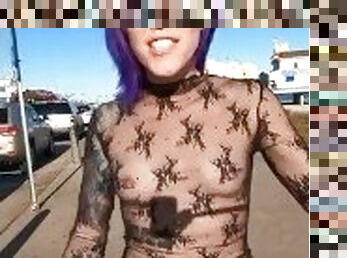 See through top on busy beach street tits on display