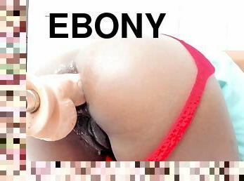 Booty ebony enjoys her fuck machine
